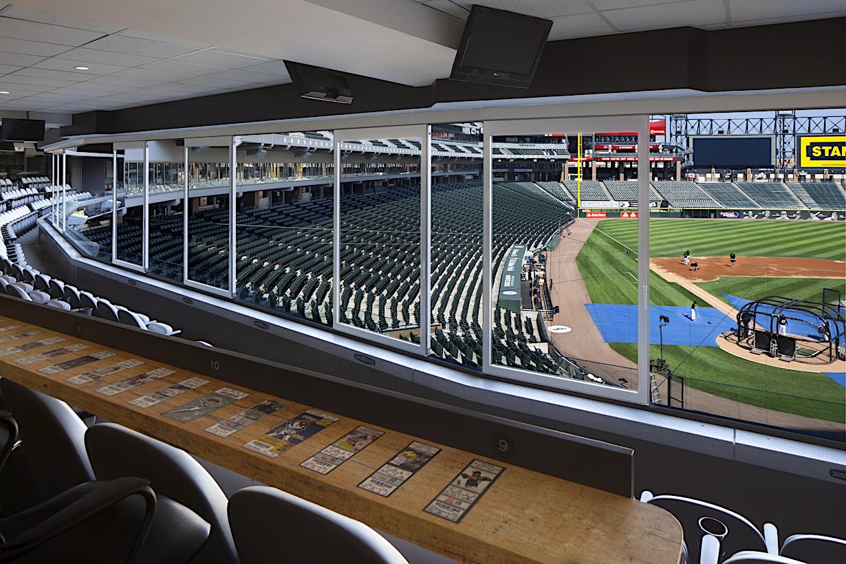 Sliding glass walls at the Chicago Whitesox stadium with a view to the field