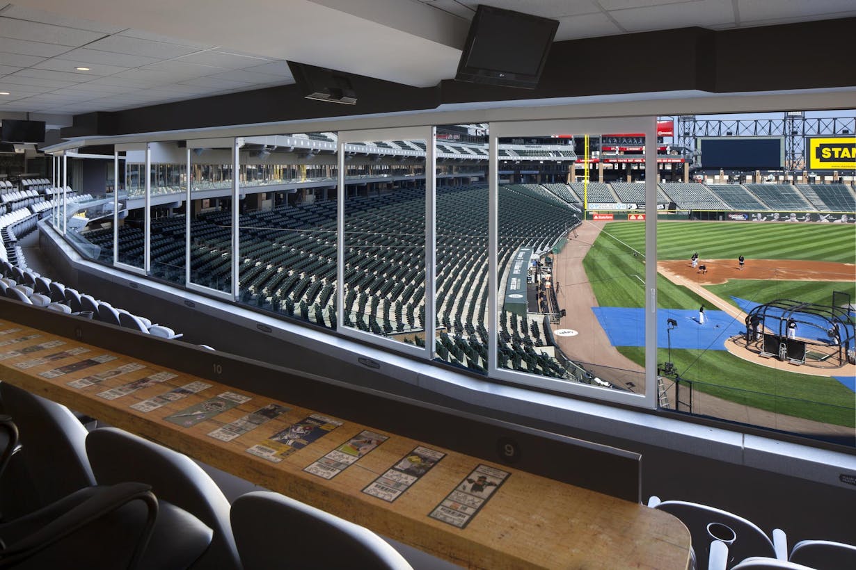 Sliding glass walls at the Chicago Whitesox stadium with a view to the field