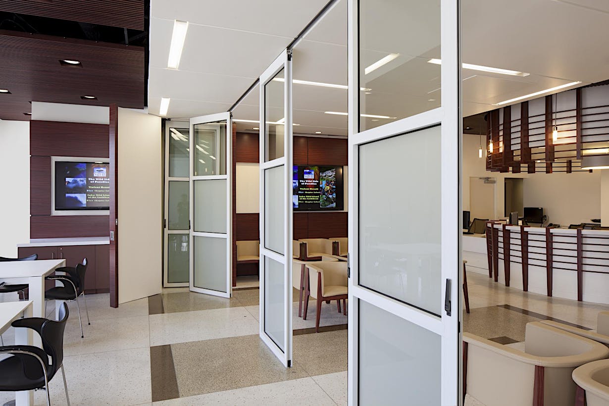 Healthcare waiting room with commercial moveable glass walls