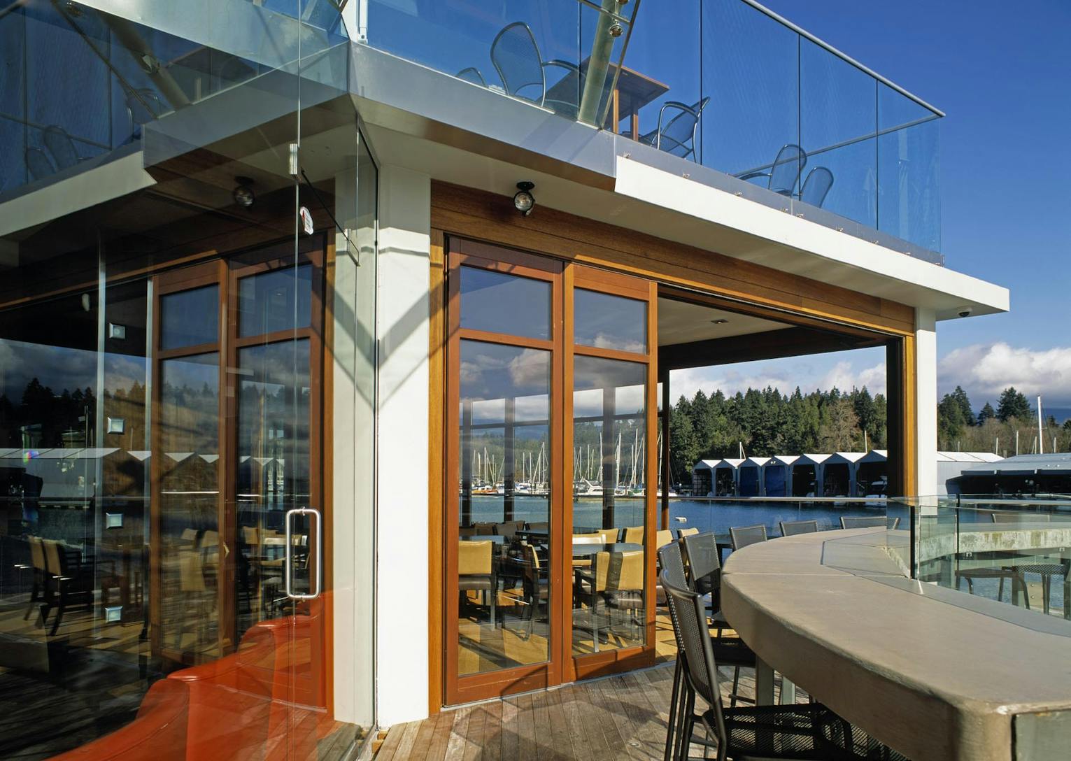 HSW66 Dock restaurant view-  Wood framed glass walls exterior 