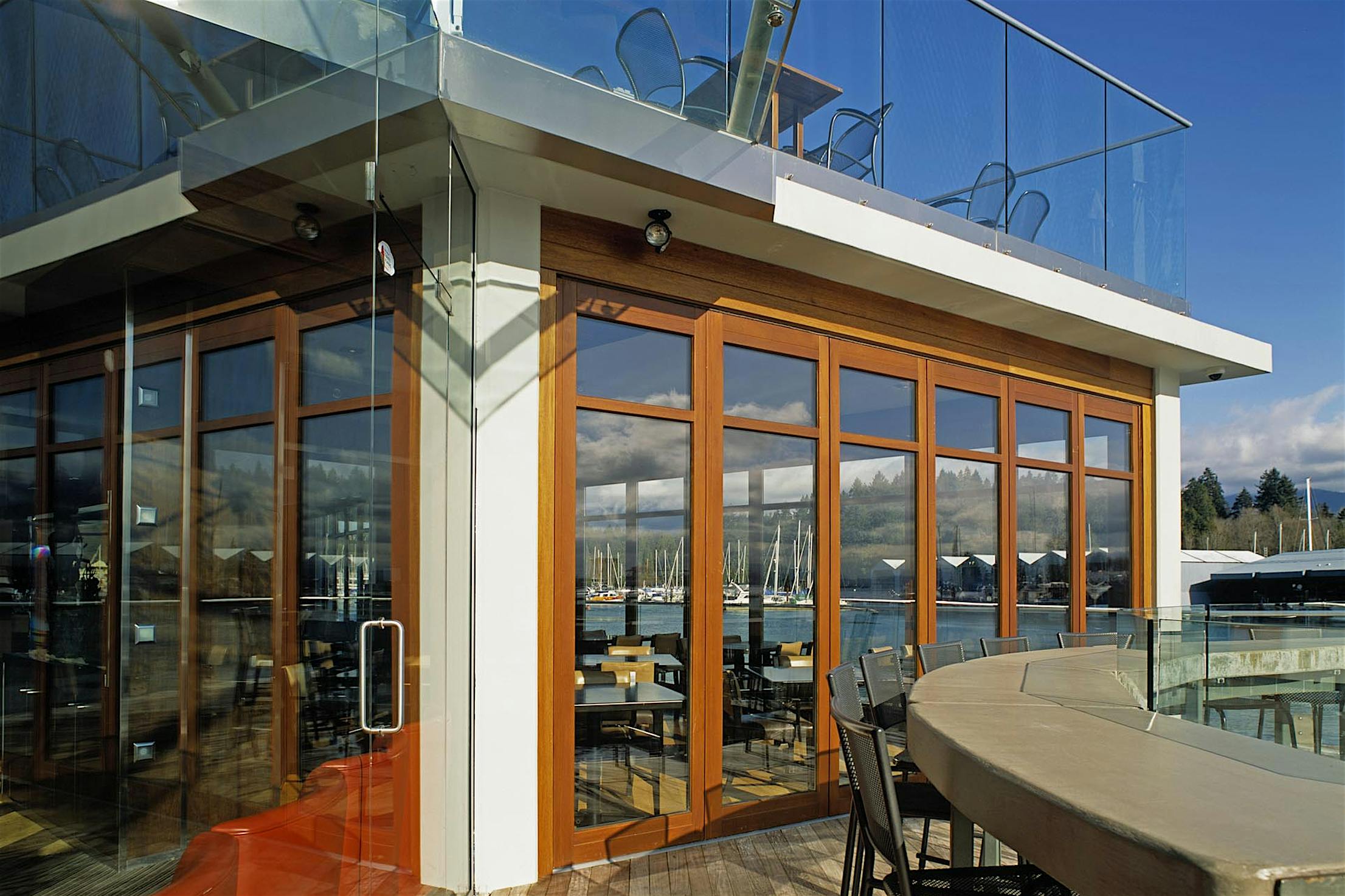 HSW66 Dock restaurant view- Wood framed glass walls exterior