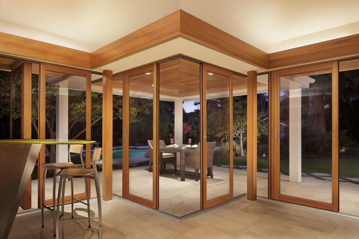 Open dining room glass doors leading to an outdoor patio  - HSW66 Sliding