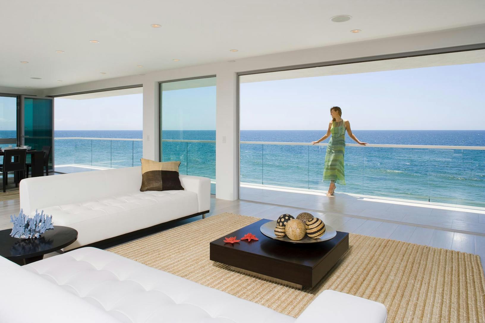 SL45 Oceanfront living room with a large folding balcony doors