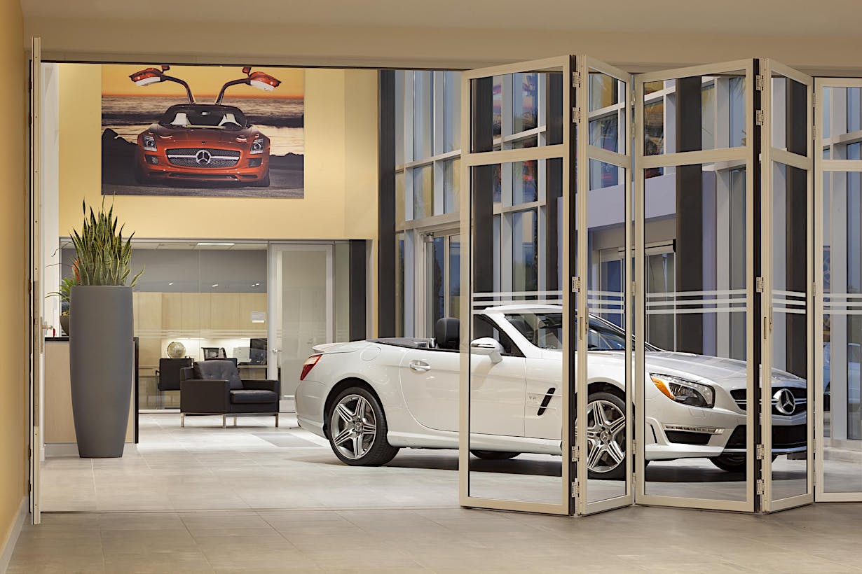 Auto showroom interior moveable glass doors