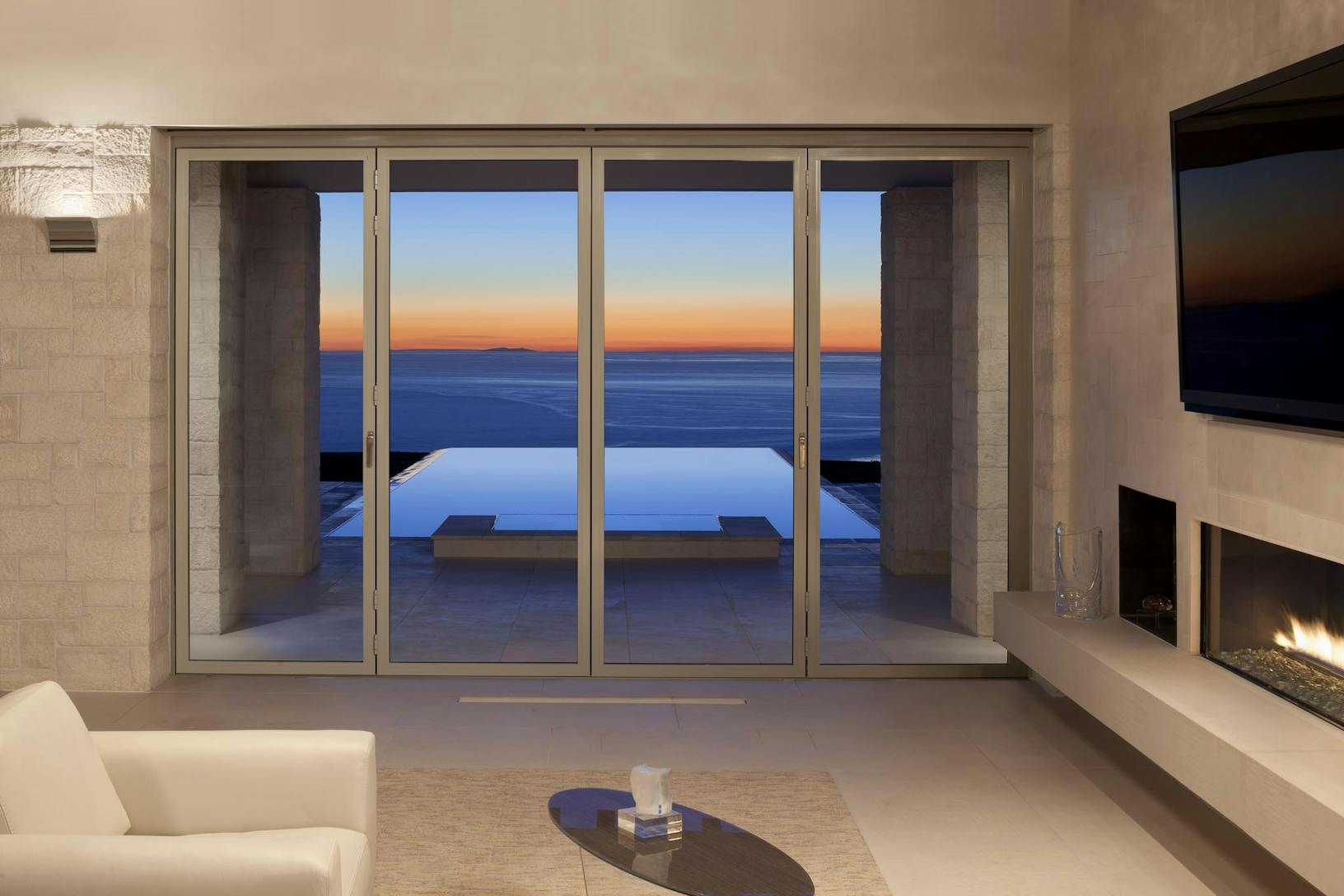 SL45 house pool large opening folding glass walls in California Coast