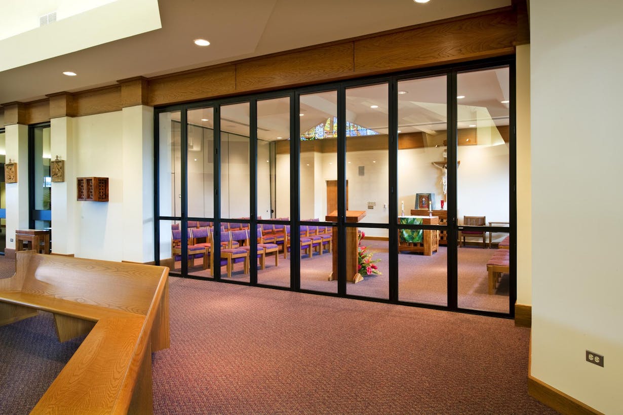 Two large rooms partitioned off with closed folding glass doors