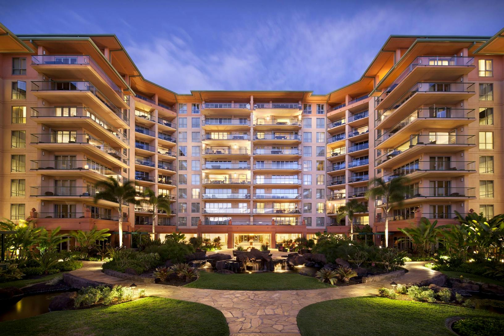 SL60 Hotel building with a courtyard and trees - extreme weather performance glass walls