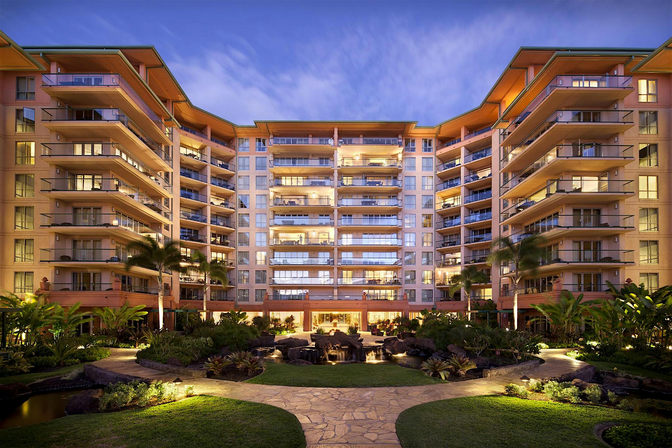 SL60 Hotel building with a courtyard and trees - extreme weather performance glass walls