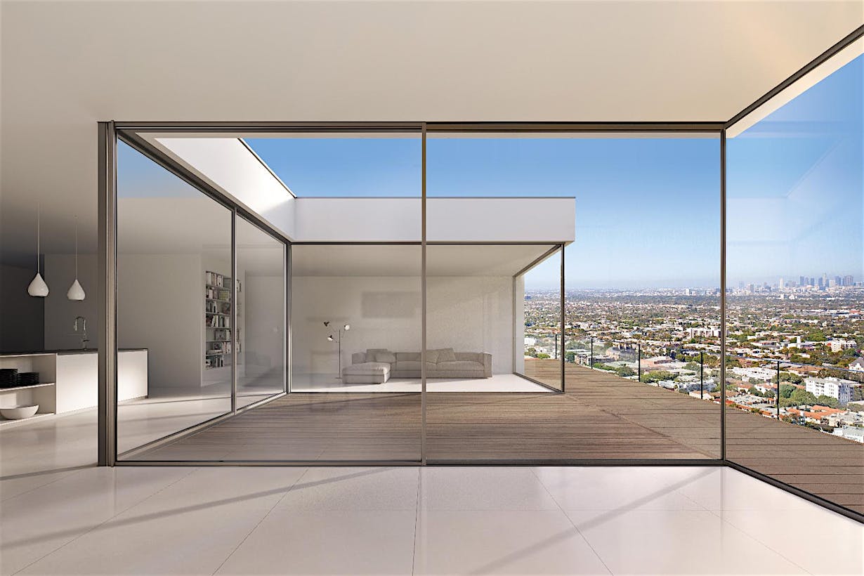 Modern minimalist interior featuring large panel minimal sliding glass walls, complemented by expansive glass windows offering a cityscape view. Connect with NanaWall