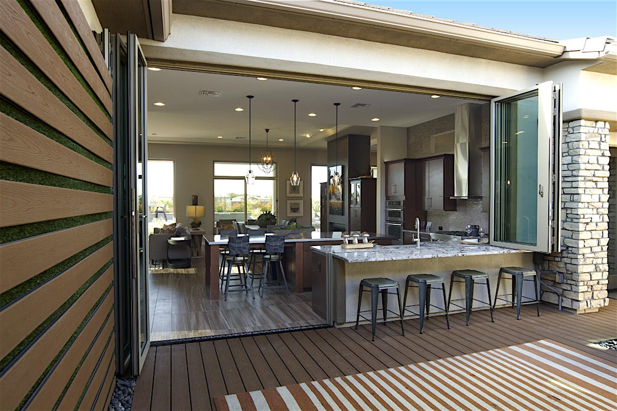 A window/door combination designed for a modern indoor outdoor kitchen