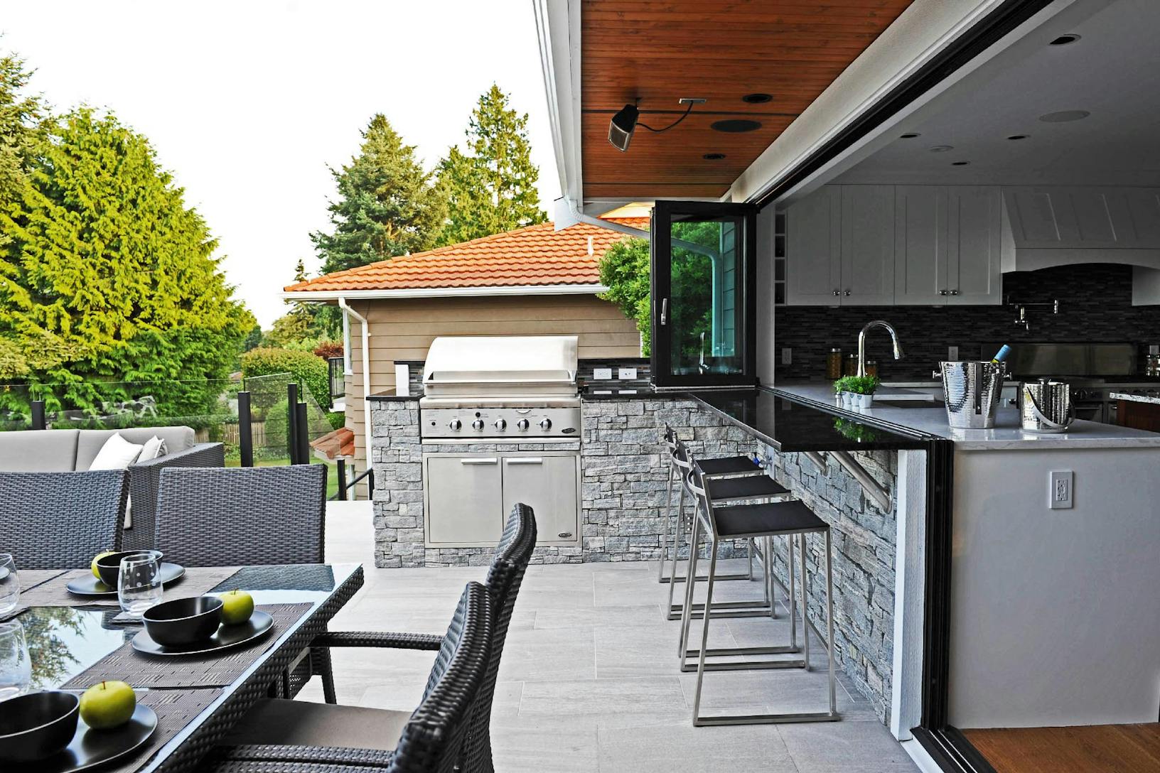 A window/door combination designed for a modern indoor outdoor kitchen and dining area