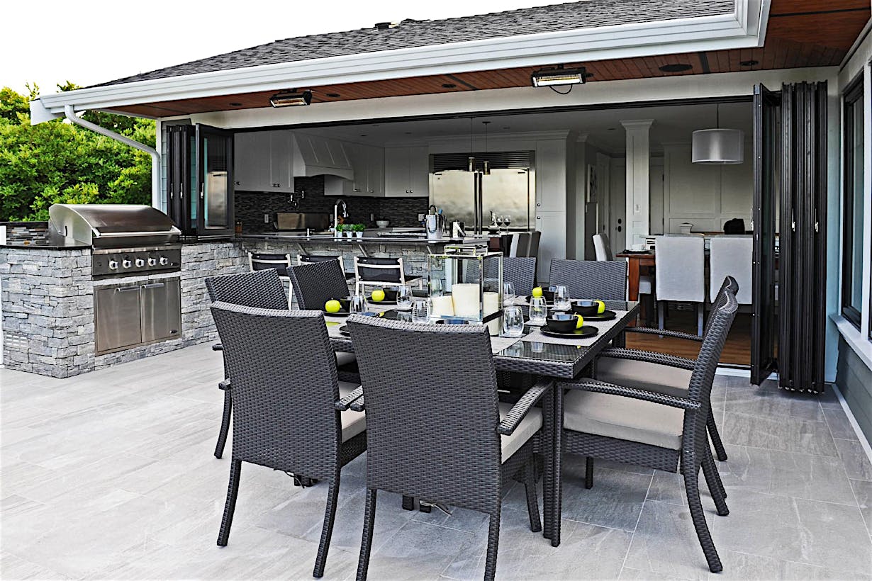 Folding exterior doors on a modern Columbus, OH home create seamless indoor-outdoor flow with clean, contemporary design