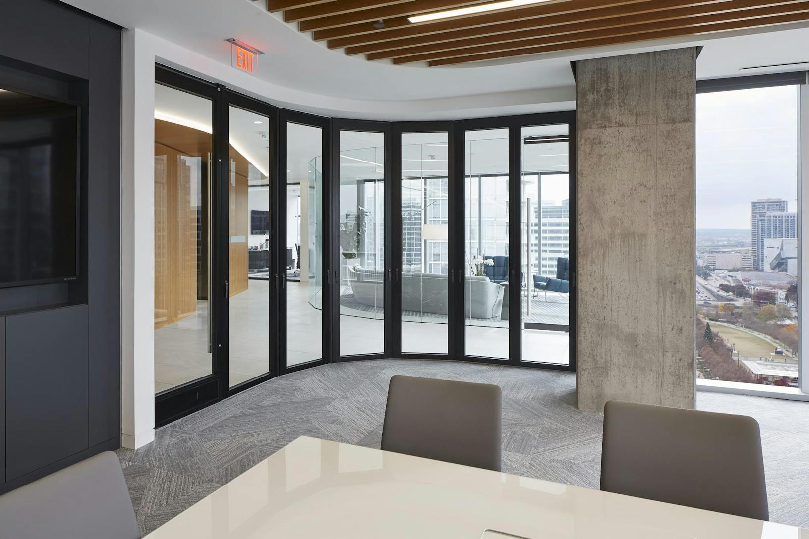Commercial high rise conference room with stacking glass walls 
