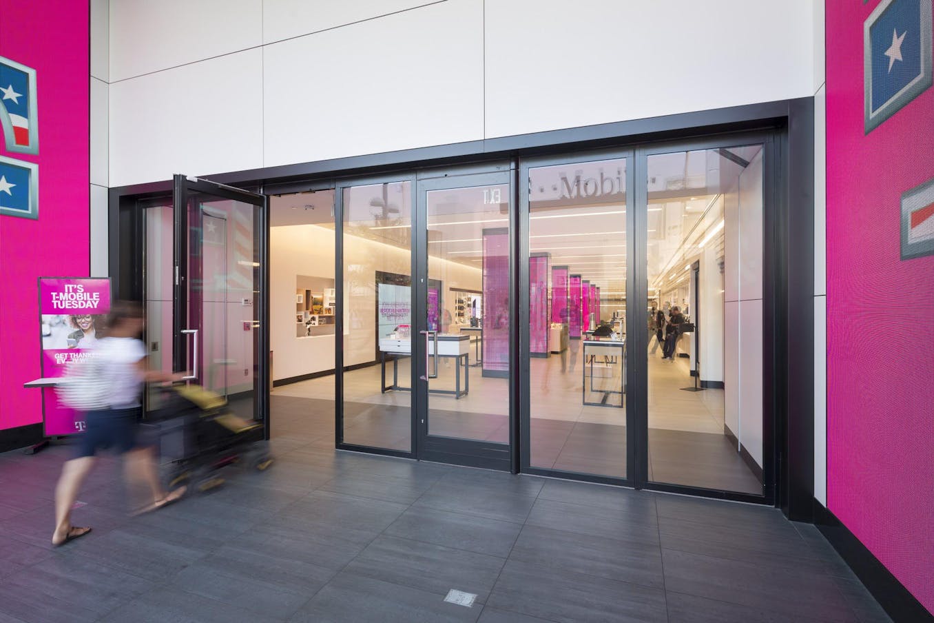 Retail storefront with a large sliding glass wall system