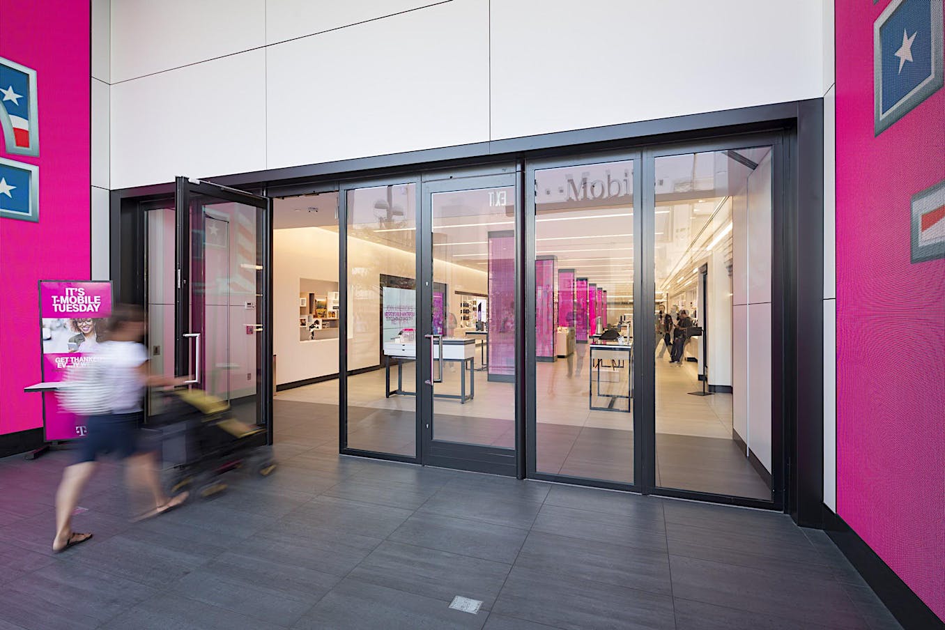 Retail storefront with a large sliding glass wall system