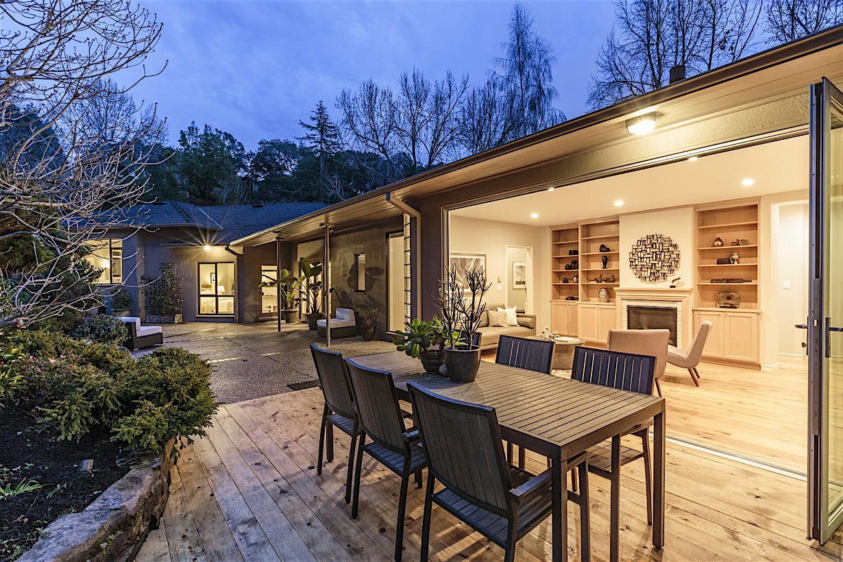 Retractable patio doors in Dublin, CA home open to create seamless indoor-outdoor living and maximize natural light