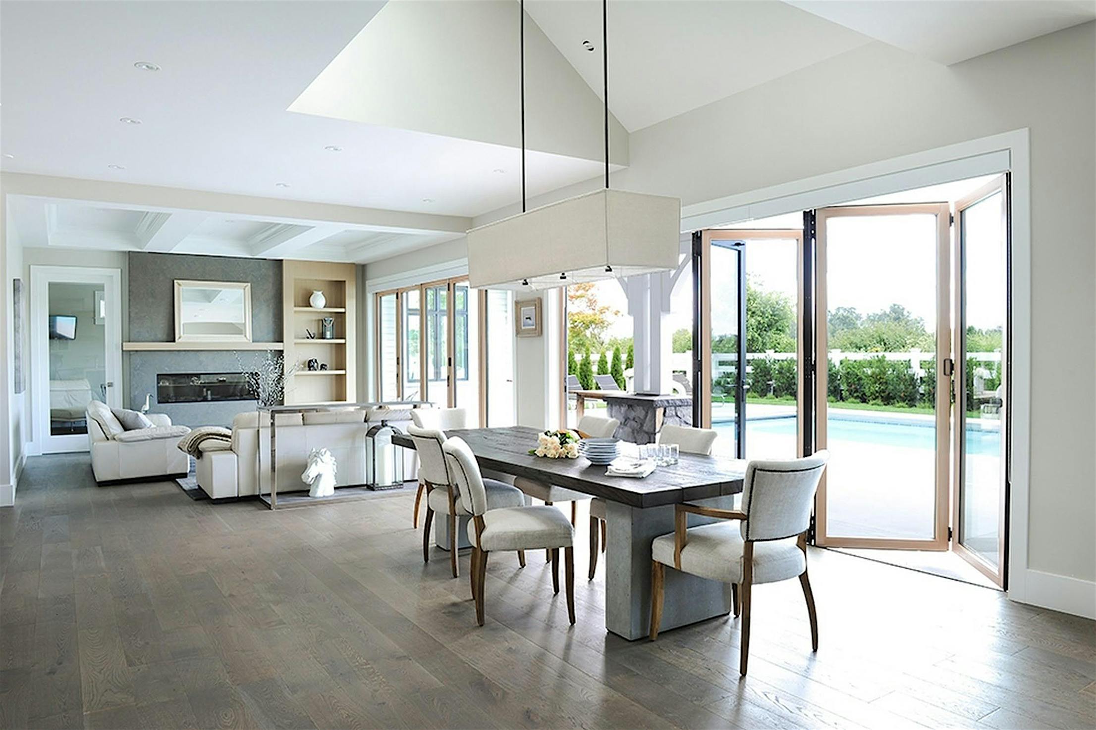 A large living and dining room with a table and chairs - Folding interior