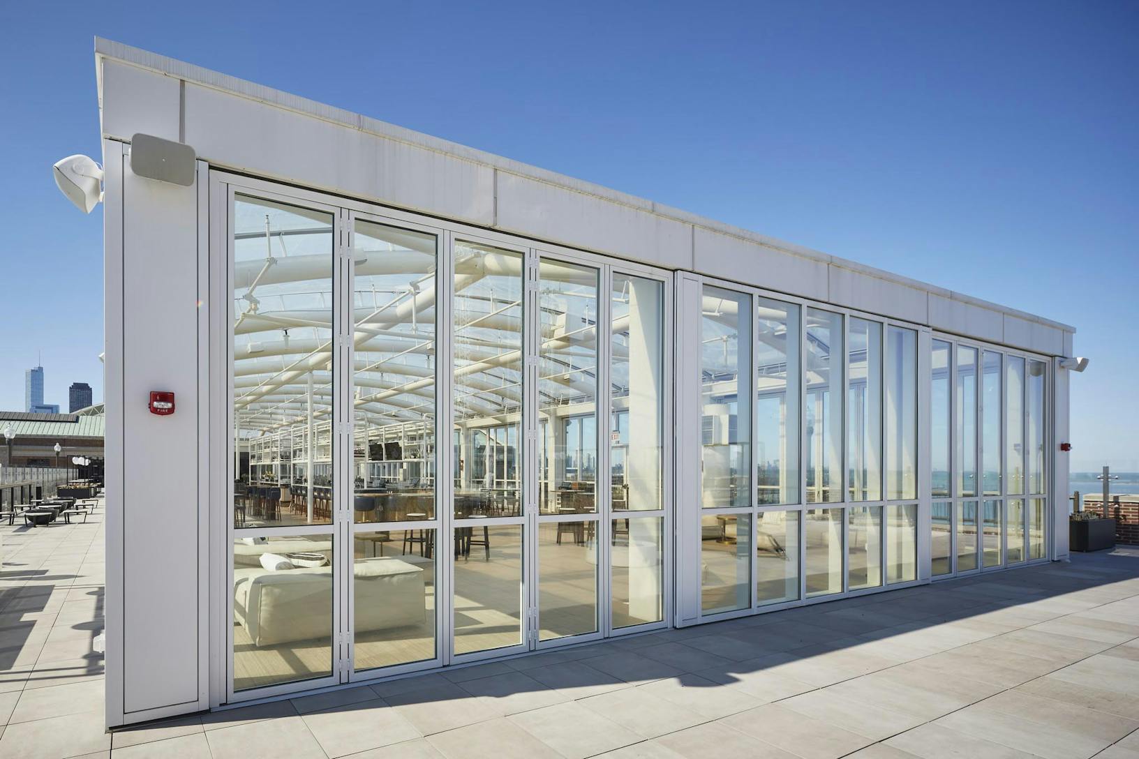 SL70 large offshore navy pier building exterior with large opening glass walls