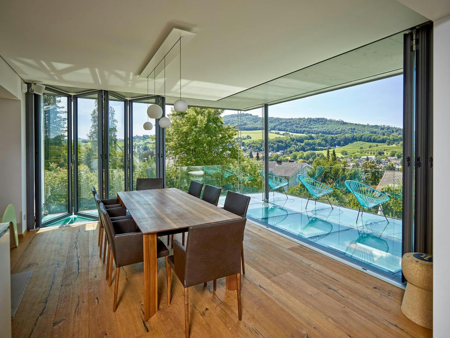 Large dining room with mountain view - closed glass walls 
