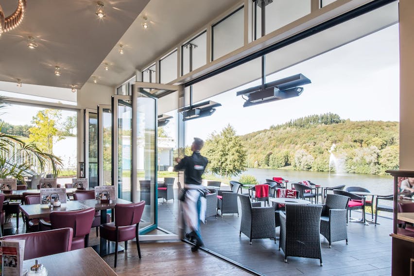 restaurant commercial design with moveable glass walls to eat outdoors