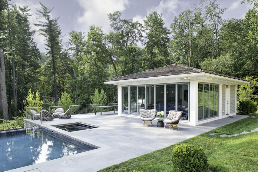 Pool house ADU with glass walls