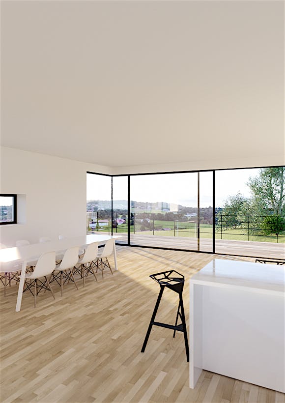A white kitchen and dining room with large opening glass walls