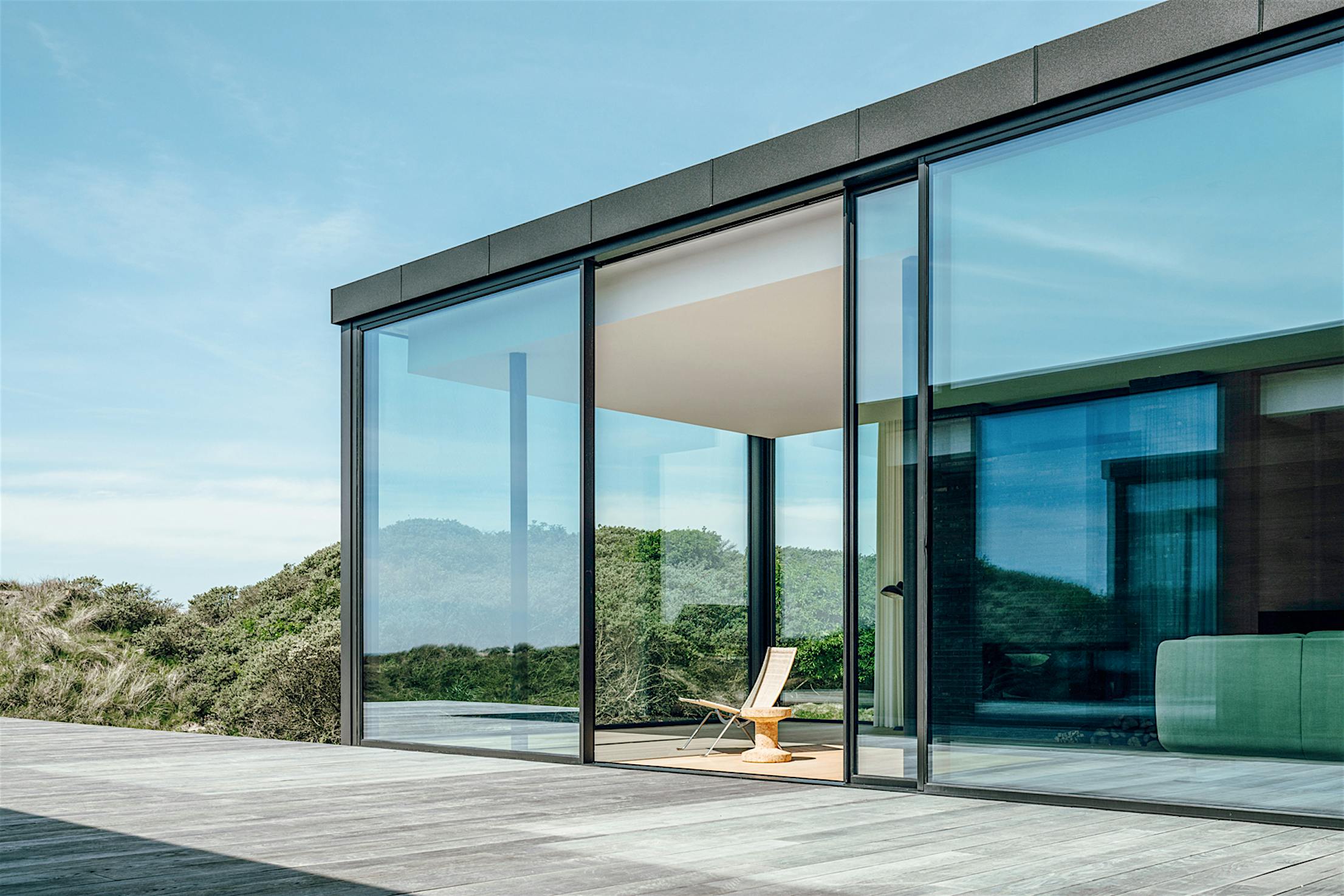 Large opening glass walls at Seaside Denmark