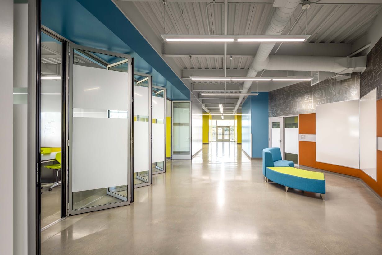 School multifunctional areas design with acoustical glass walls -NW Acoustical 645 Folding