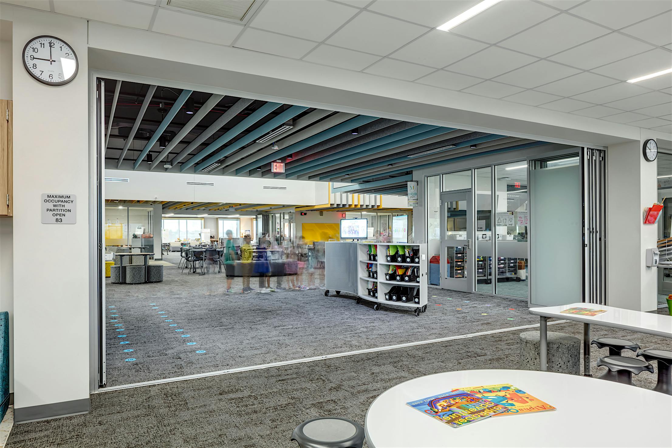 Classroom collaborative environment with acoustical movable glass walls