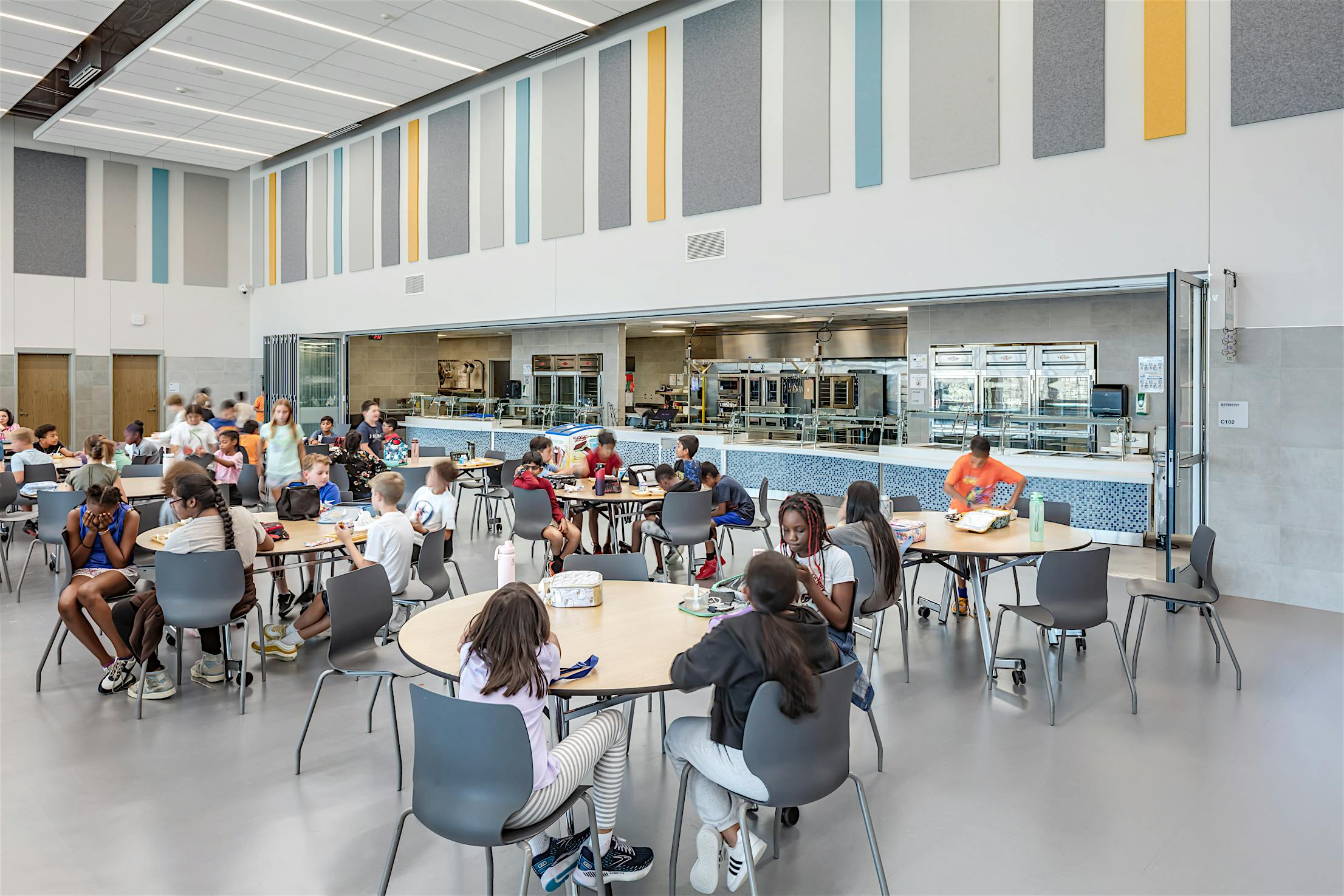 Acoustical movable glass walls at Minett Elementary- Folding exterior