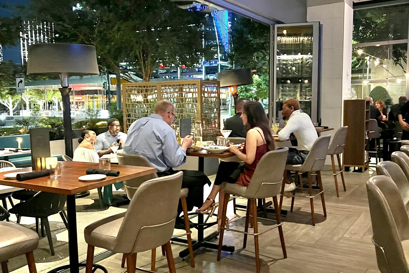 Outdoor dining area with folding patio doors 