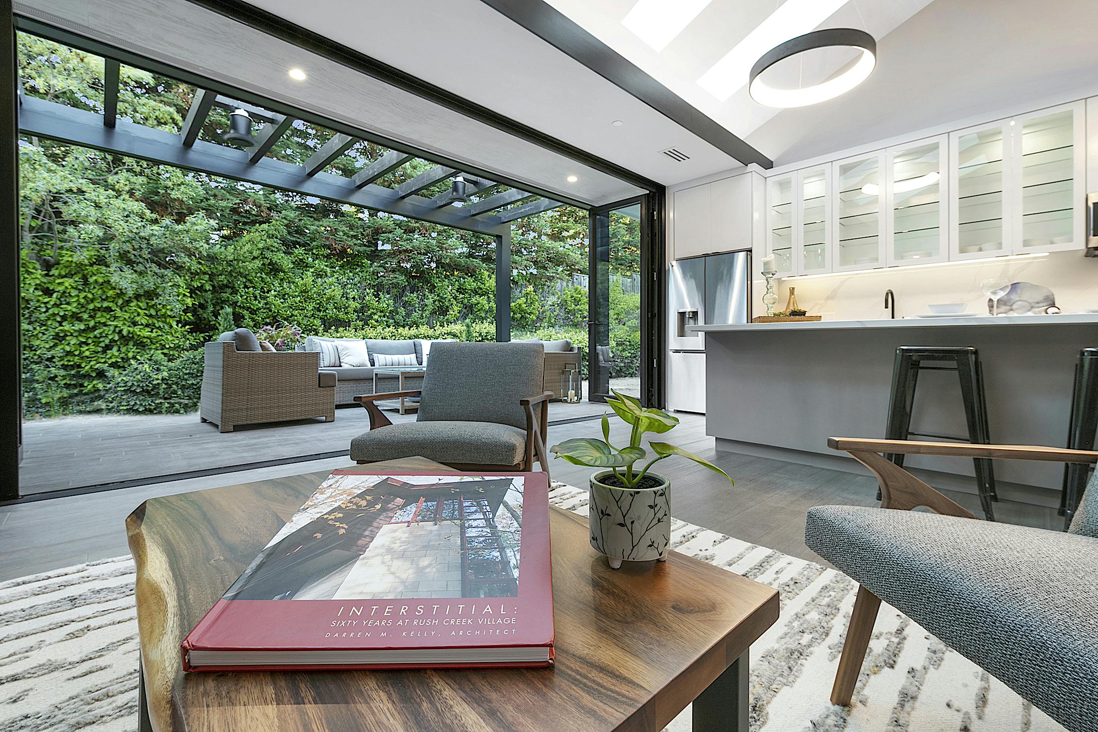 Modern ADU living room with Aluminum Clad Folding doors