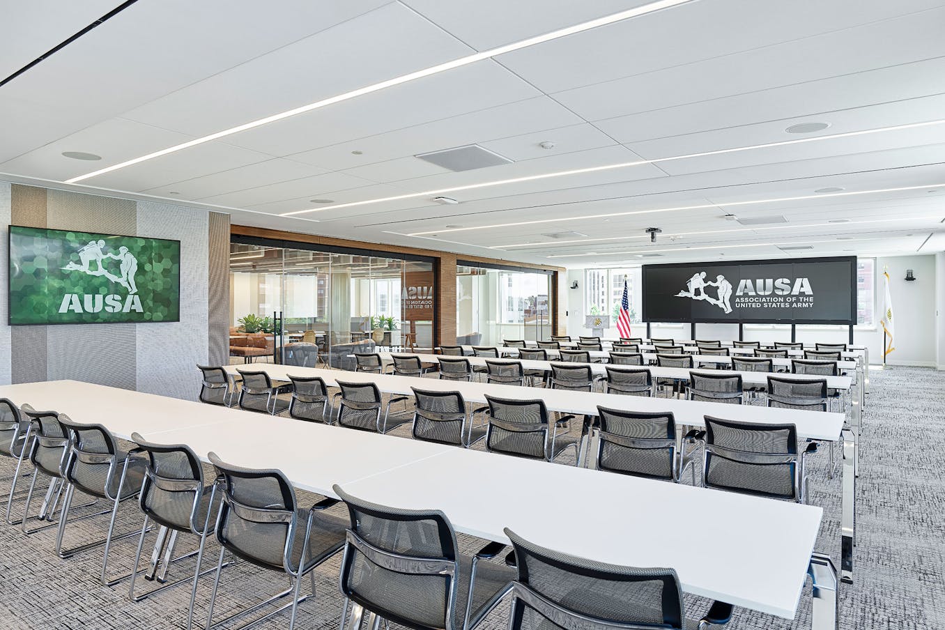 A conference room designed with frameless glass walls for a modern and sleek aesthetic