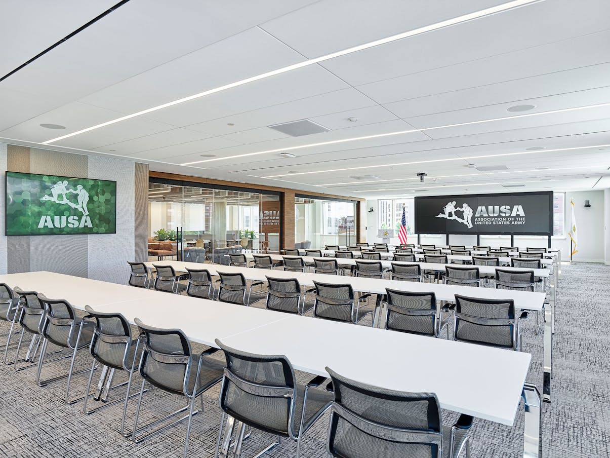 A conference room designed with frameless glass walls for a modern and sleek aesthetic