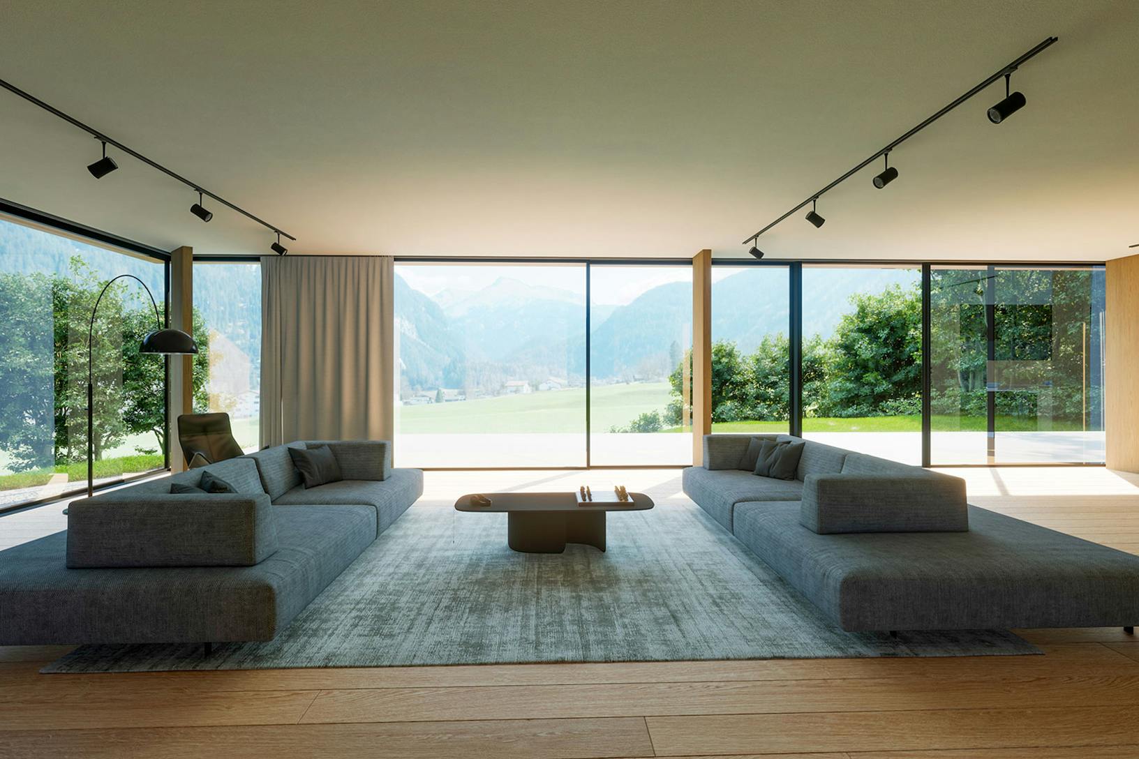 A contemporary living room with large panel sliding walls overlooking the mountains.