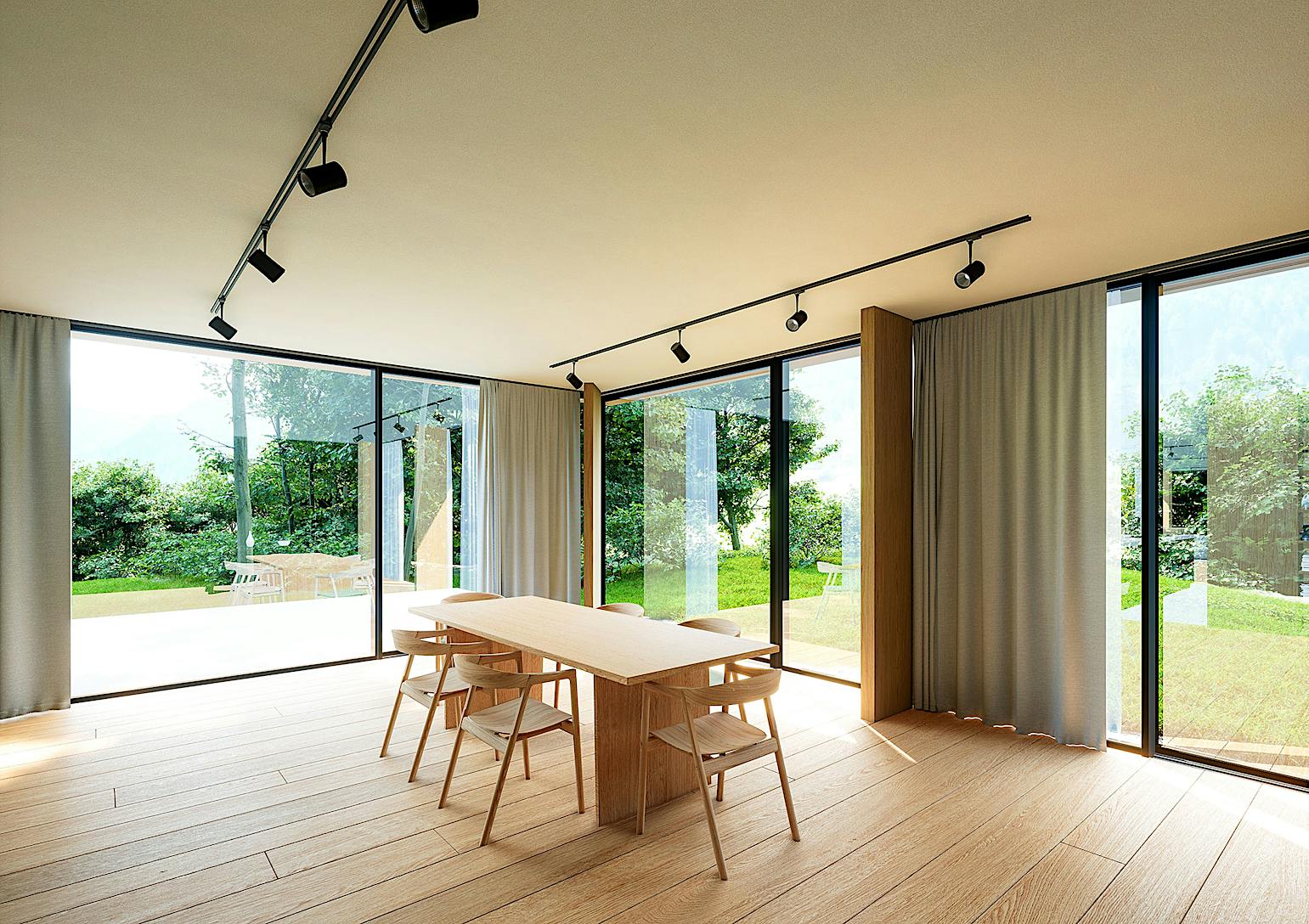 A dining room with minimal sliding glass walls and a wooden table