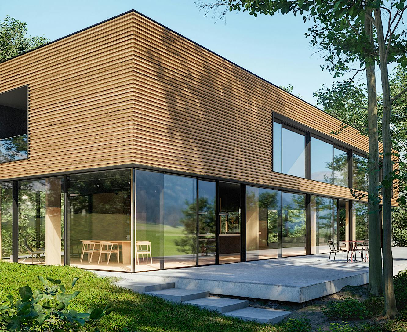 A modern house featuring sliding patio doors that bring the surrounding natural beauty indoors