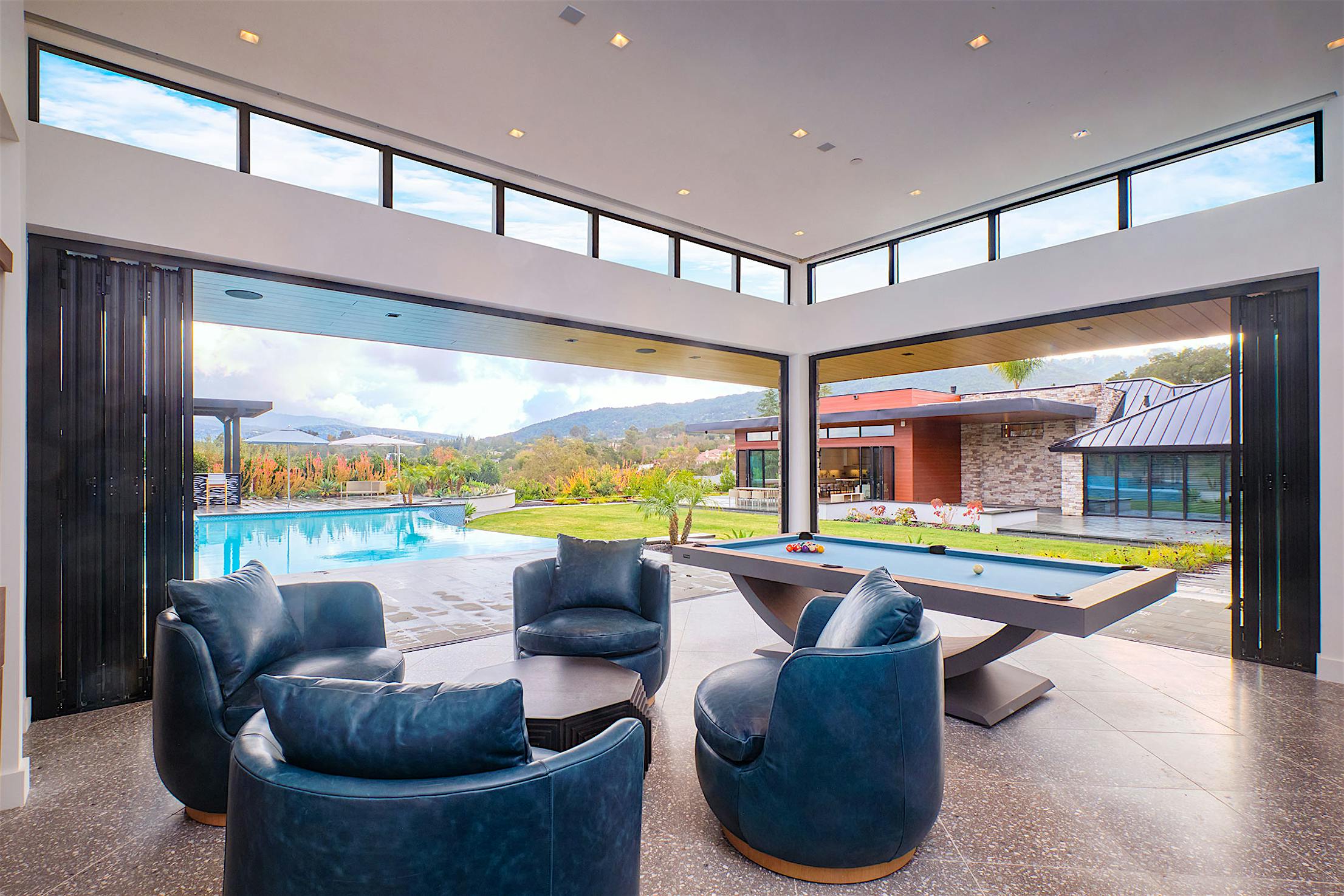 ADU features folding glass walls with SixFold panel set configuration