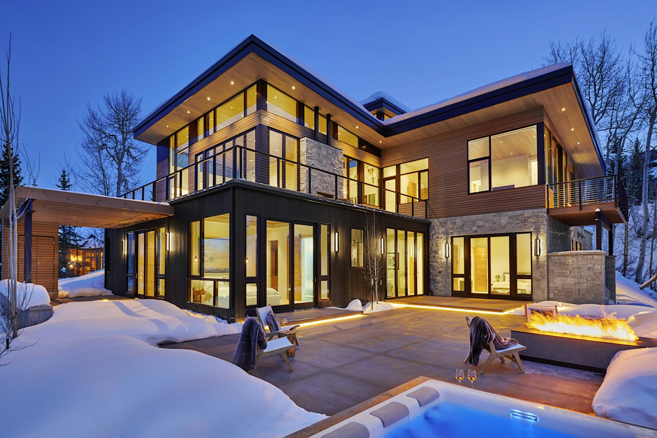 energy-efficient resilient home design with NanaWall opening glass doors