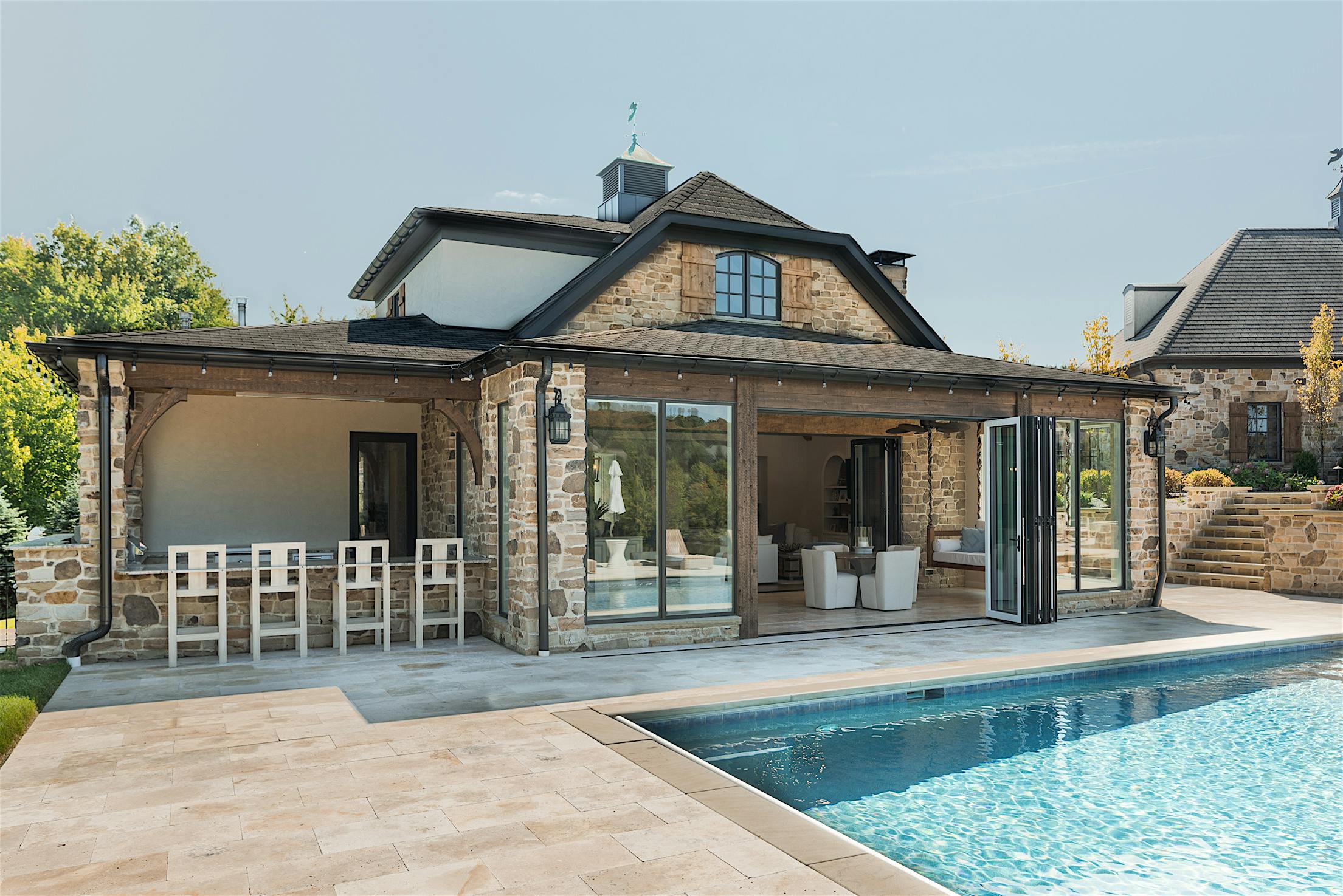 Ohio pool house with NanaWall aluminum clad bifold doors