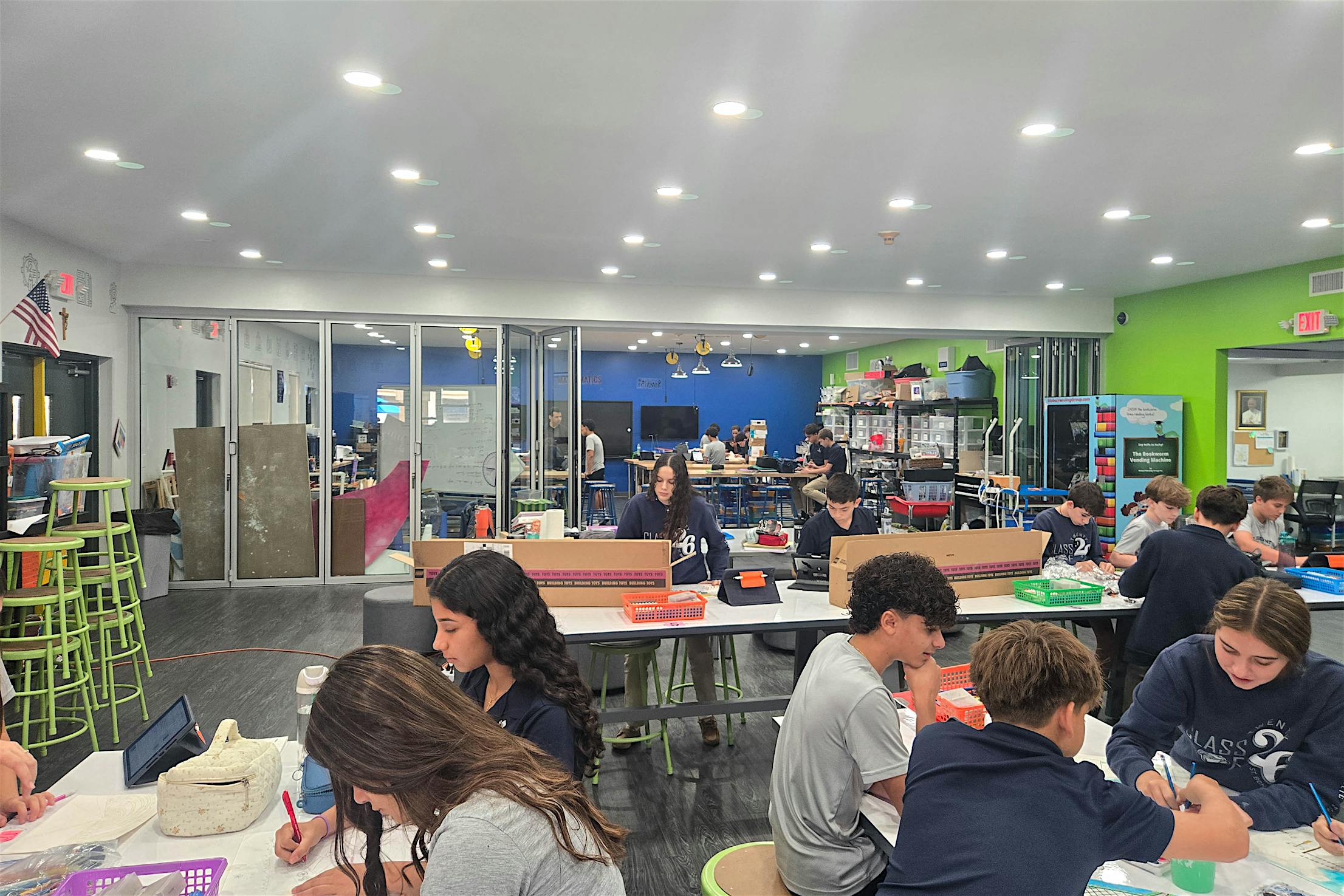 Classroom at St. Bonaventure Catholic School (Davie, FL) featuring NanaWall NW Acoustical 645 folding glass wall dividing learning zones