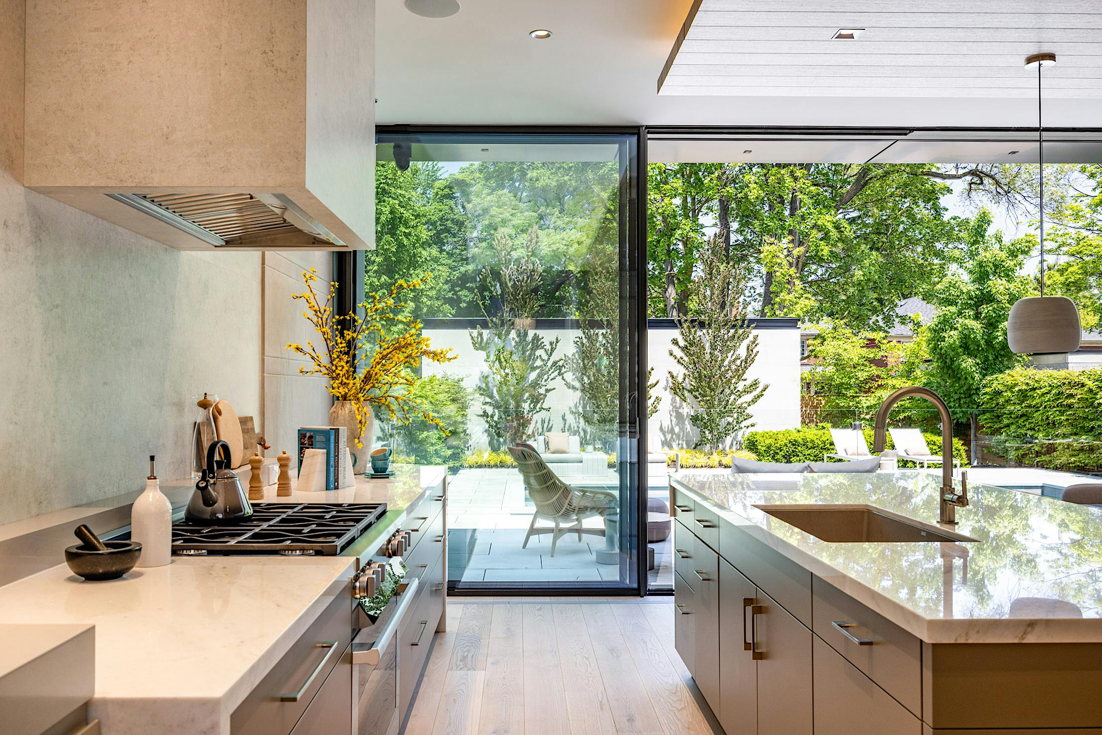 kitchen design with minimal sliding glass wall by NanaWall