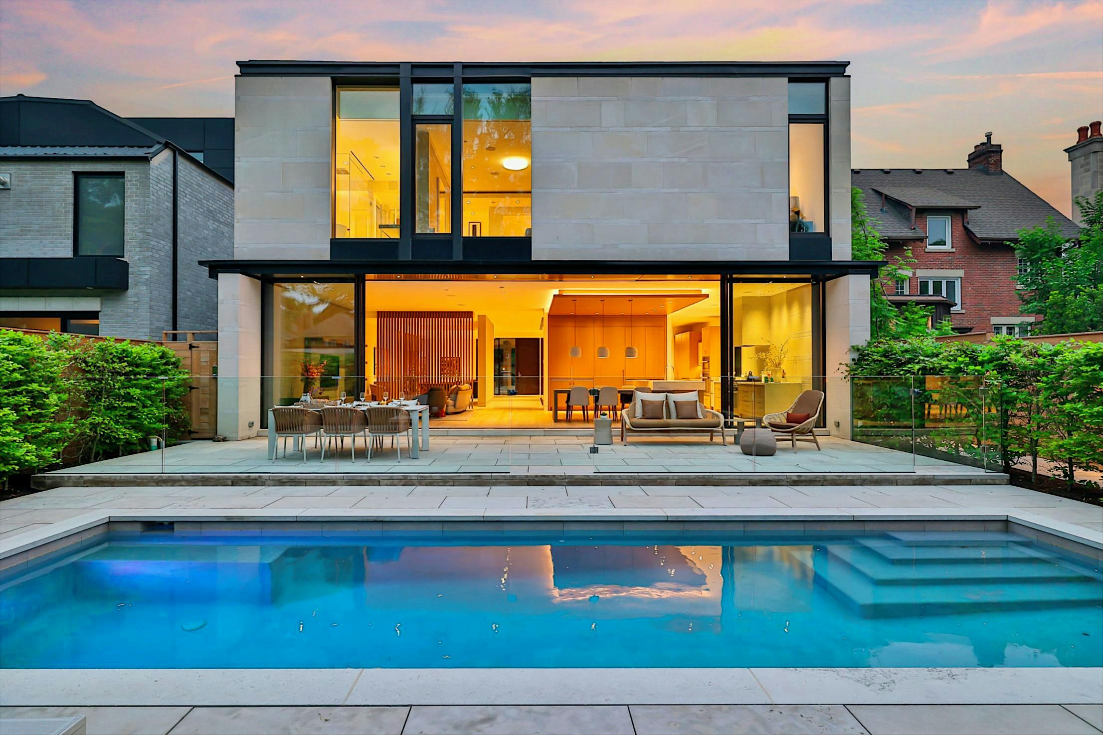 back view of Infinity House with large minimal sliding glass wall