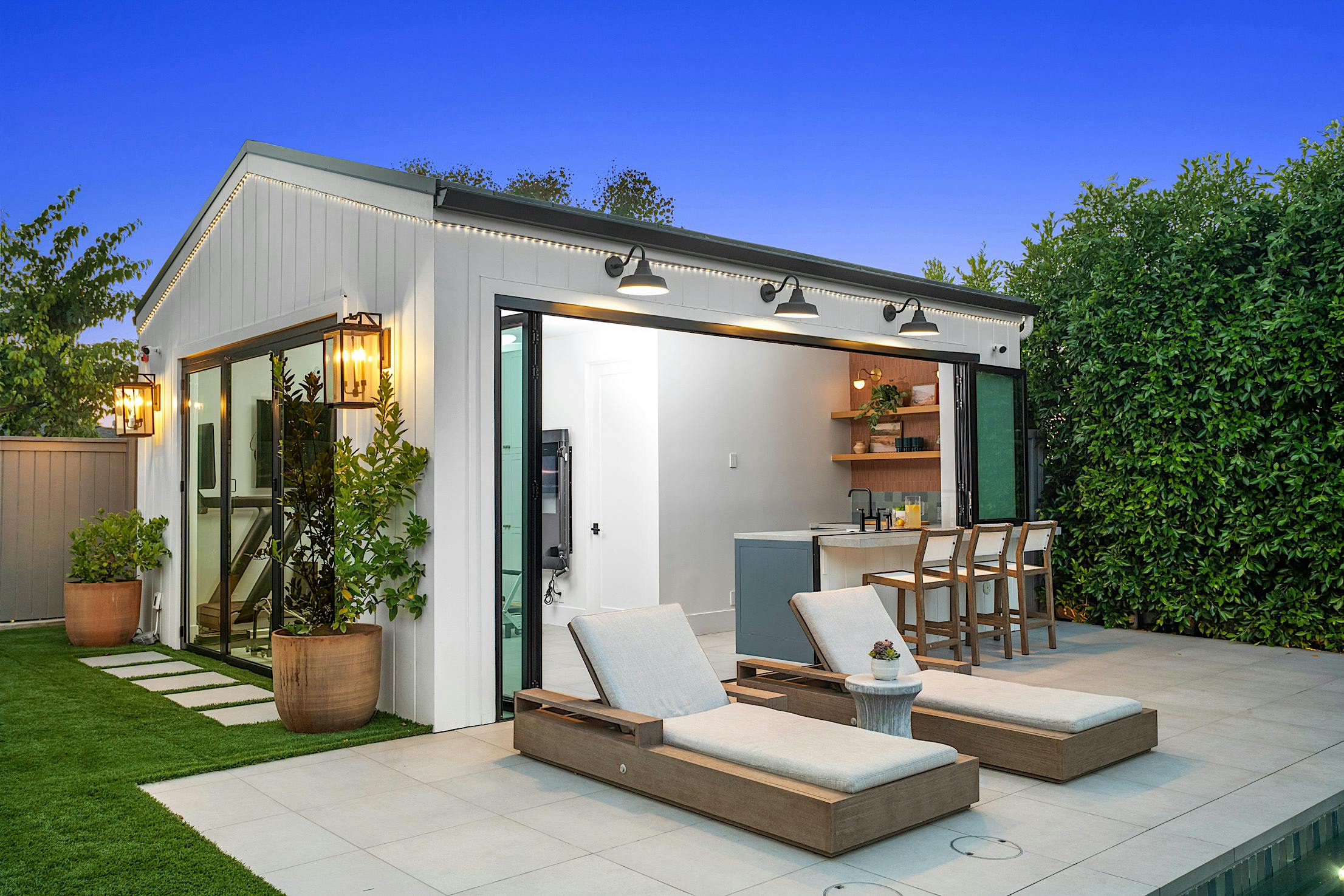 pool house folding patio doors by NanaWall