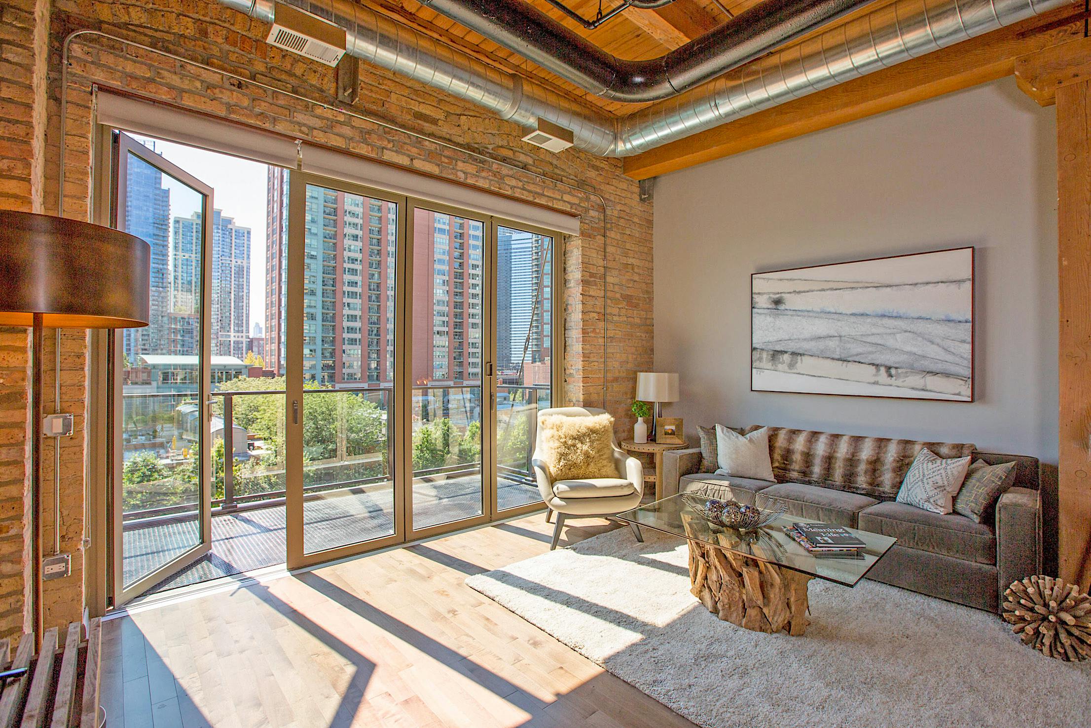 multifamily building designed with bifolding glass doors by NanaWall