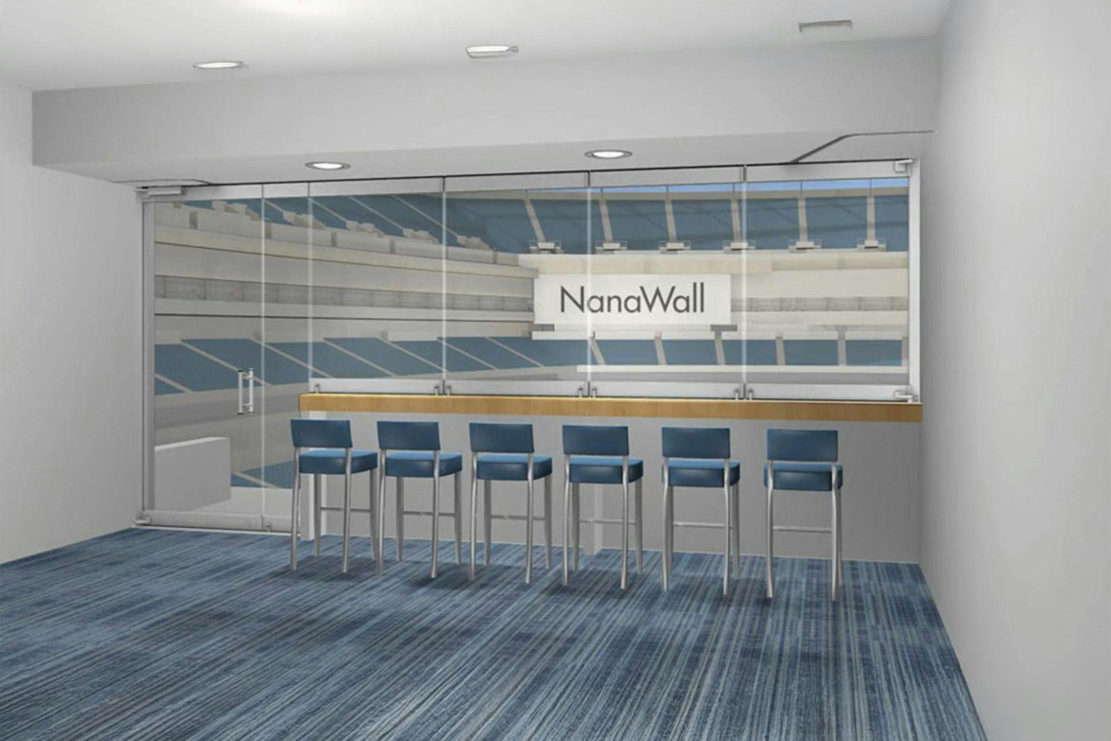NanaWall window-door combination in a stadium VIP suite: windows and glass doors integrated in one opening