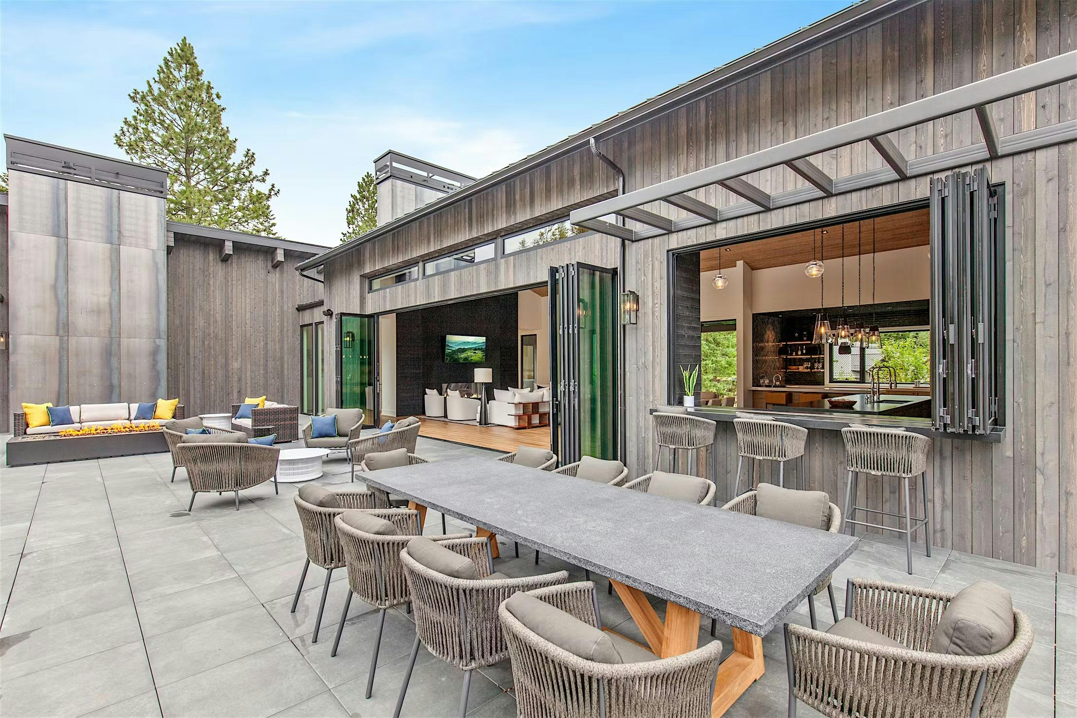 indoor-outdoor living with folding patio doors and windows