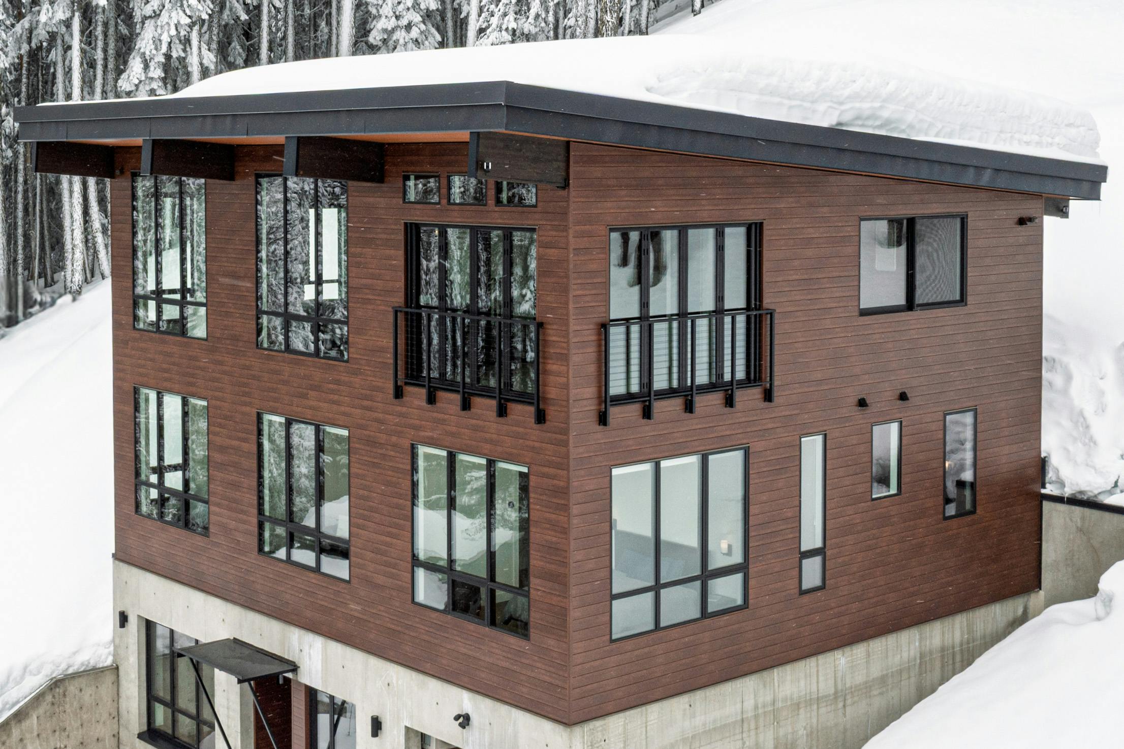 prefab home with bifold glass doors