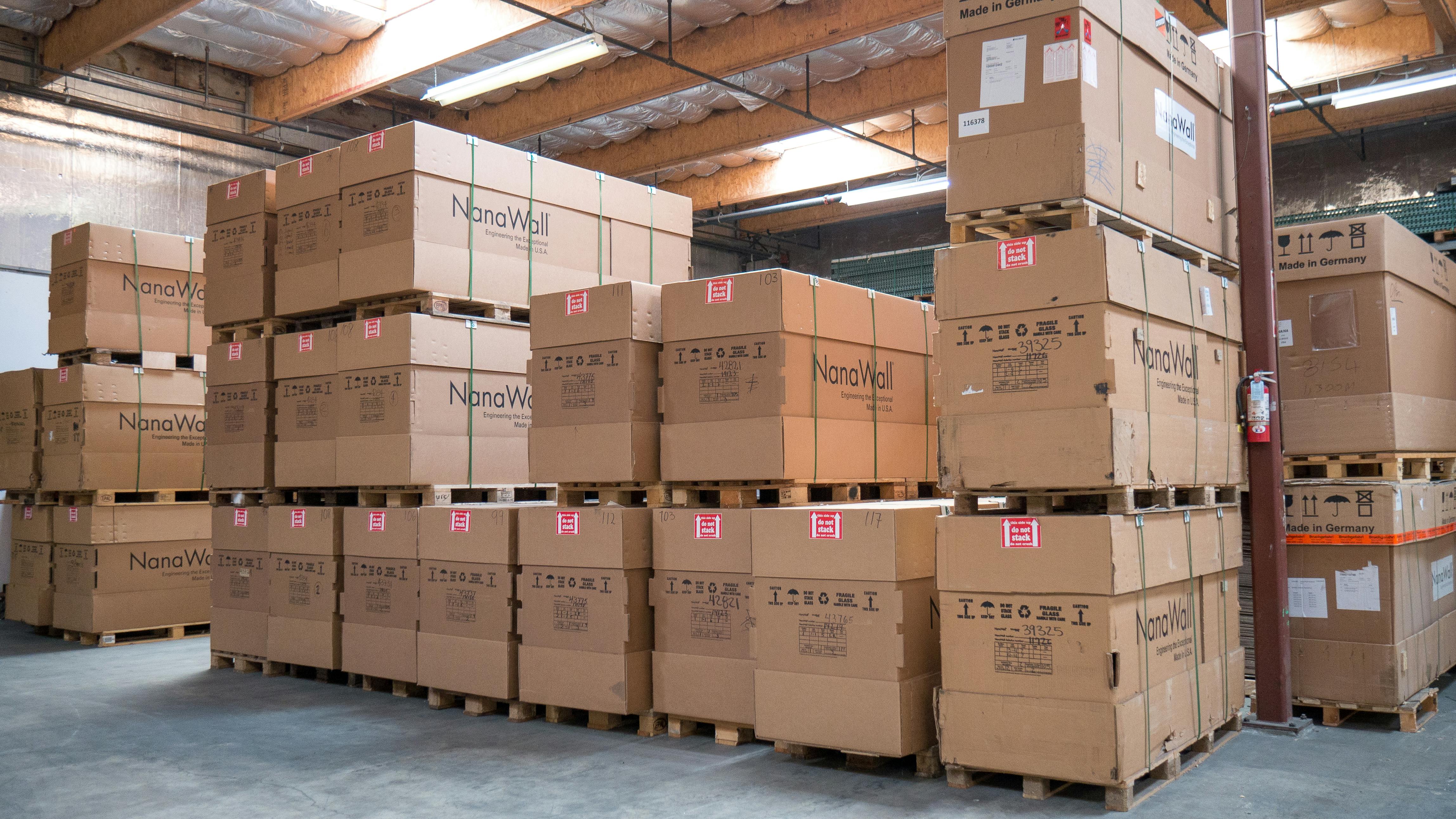 Packaged NanaWall glass wall systems prepared for shipment from the California factory