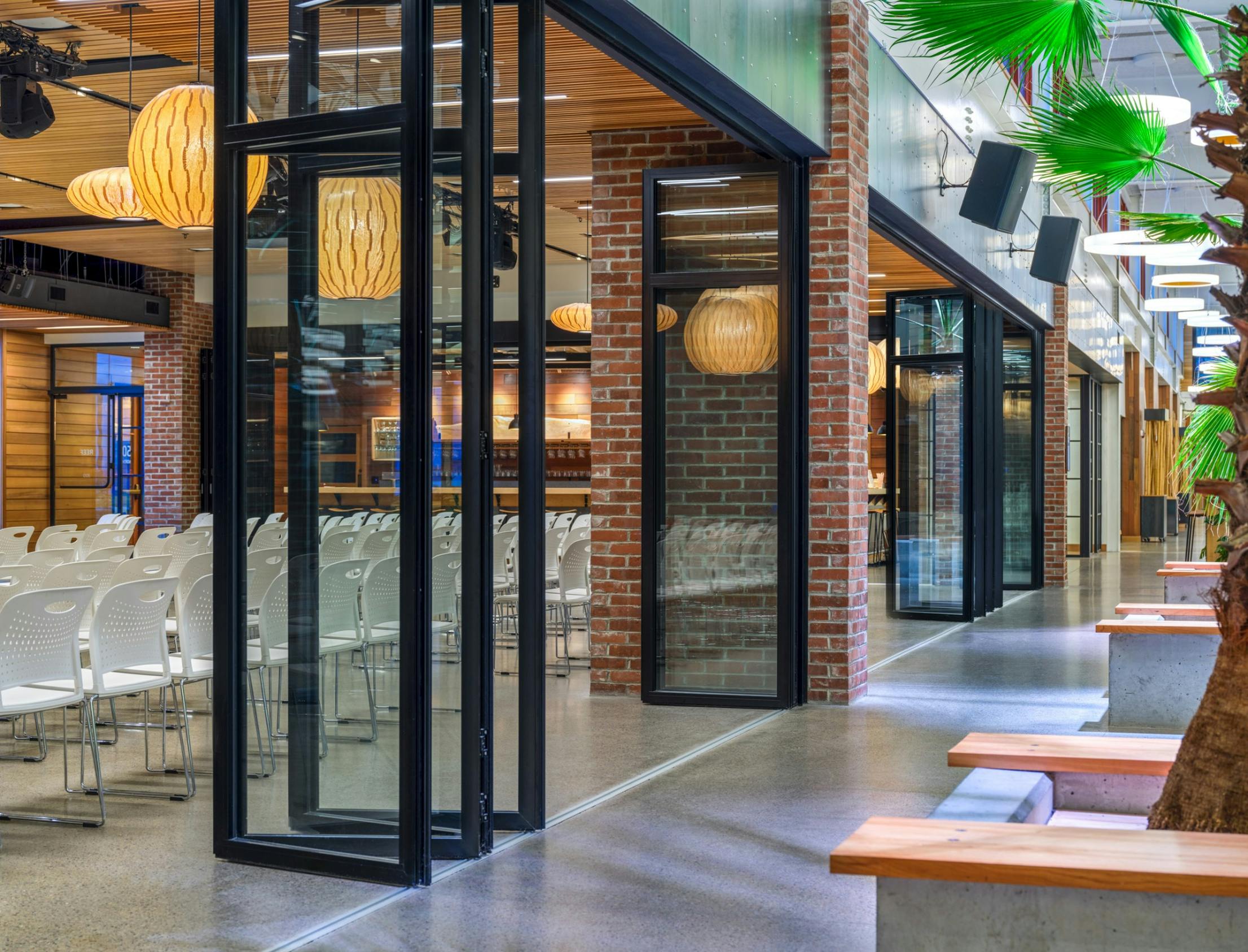 Coworking campus with interior folding glass walls 